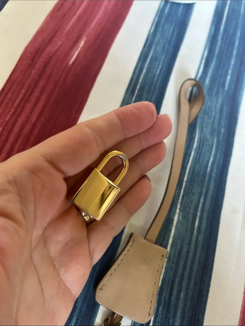 MCM jet and lock gold color with cream lanyard amazing condition